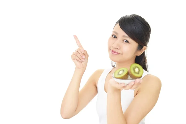 Woman holding fruits — Stock Photo, Image