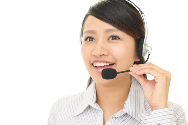 Operador de call center sorridente — Fotografia de Stock