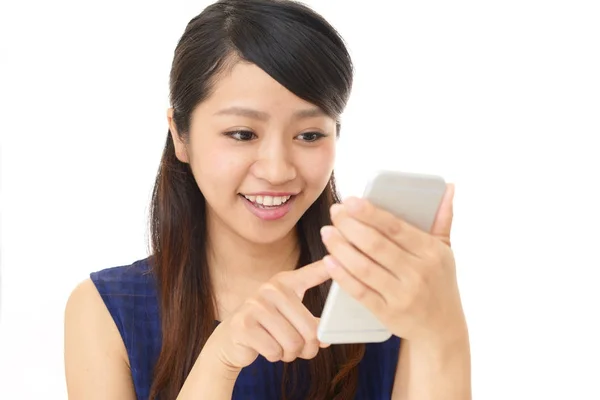 Woman with a smart phone — Stock Photo, Image