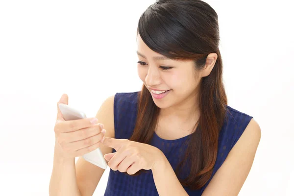 Woman with a smart phone — Stock Photo, Image