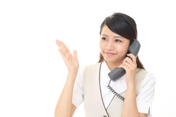 Mulher de negócios com um telefone — Fotografia de Stock