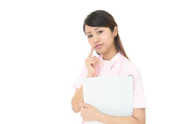 Preocupada enfermera asiática . — Foto de Stock