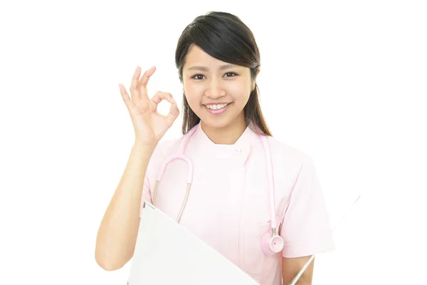 Sorridente infermiera femminile — Foto Stock