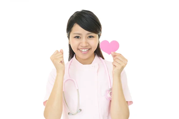 Sorridente infermiera femminile — Foto Stock