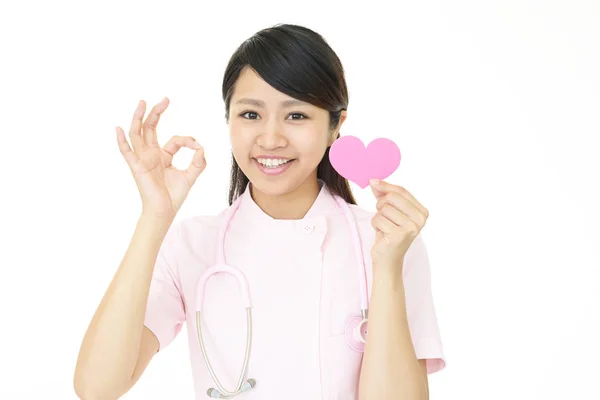 Uśmiechnięta kobieta pielęgniarka — Zdjęcie stockowe