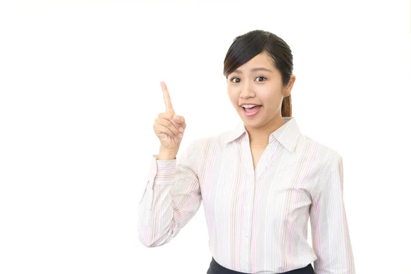 Asian business woman pointing — Stock Photo, Image