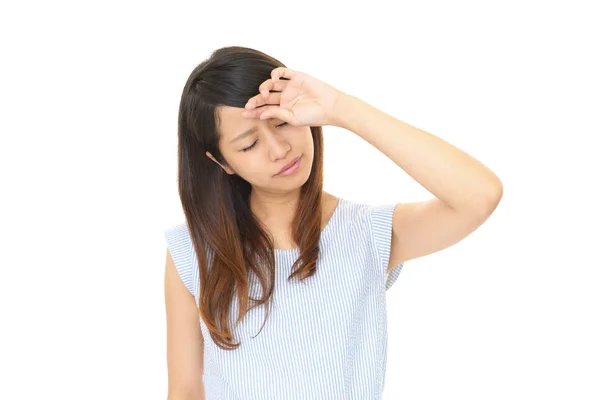 Frau, die Kopfschmerzen hat — Stockfoto