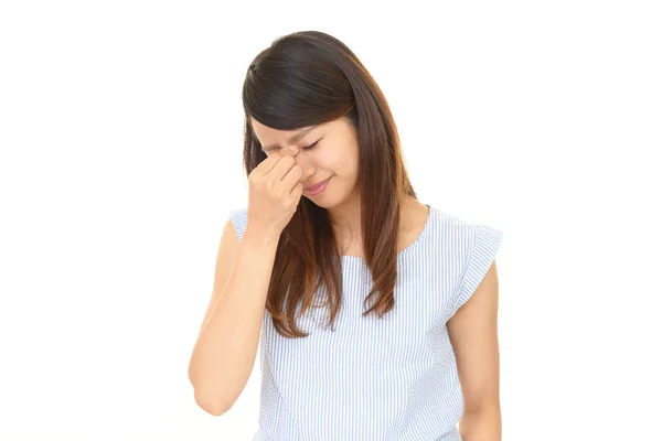 Kvinna som har huvudvärk — Stockfoto