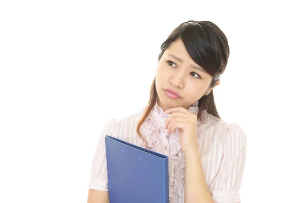 Uneasy Asian business woman — Stock Photo, Image