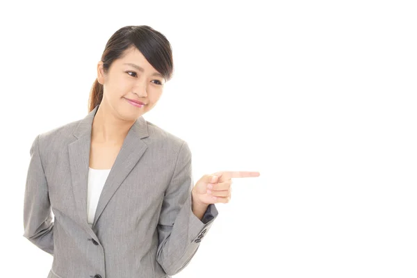 Asian business woman pointing — Stock Photo, Image