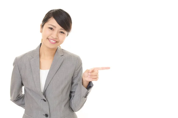 Asian business woman pointing — Stock Photo, Image