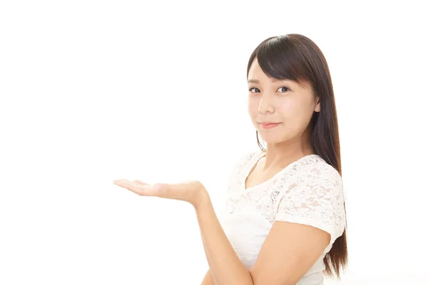 Woman Showing Something Palm Her Hand — Stock Photo, Image