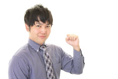 Beyaz arka plan üzerinde izole başarı zevk iş adamı