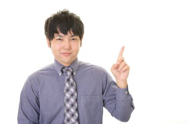 Asya işadamı izole üzerinde beyaz arka plan işaret