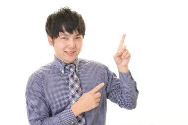 Asya işadamı izole üzerinde beyaz arka plan işaret