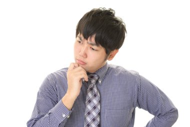 Huzursuz görünen bir iş adamı portresi