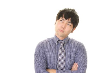 Huzursuz görünen bir iş adamı portresi