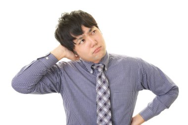 Huzursuz görünen bir iş adamı portresi