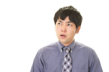 yorgun ve stresli Asya iş adamı