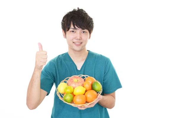 Sonriente Asiático Hombre Con Frutas — Foto de Stock