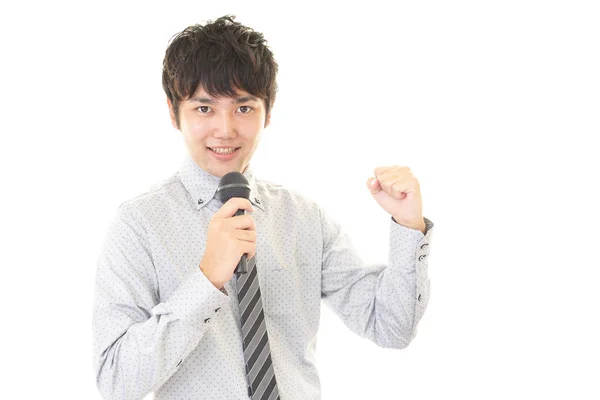 Man Holding Microphone Isolated White Background — Stock Photo, Image