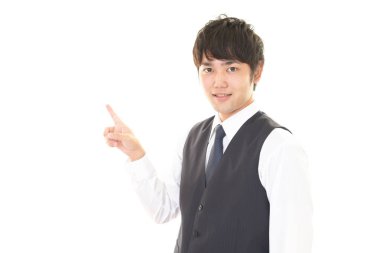 İşadamı parmağıyla işaret ediyor.