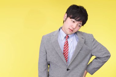 yorgun ve stresli Asya iş adamı