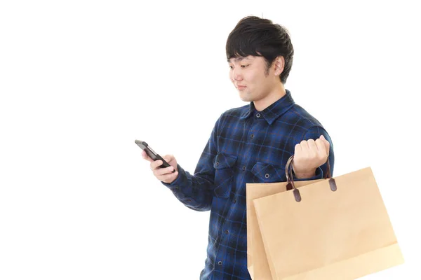 Hombre Asiático Sosteniendo Teléfono Inteligente — Foto de Stock