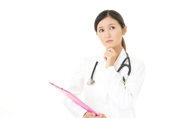 Ανησυχούν Γυναίκα Γιατρό Που Απομονώνονται Λευκό Φόντο — Φωτογραφία Αρχείου