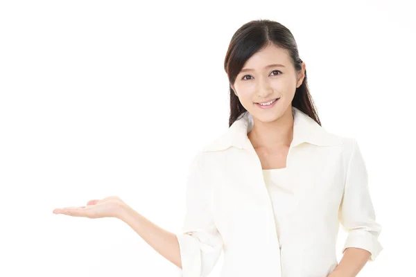 Woman showing something on the palm of her hand