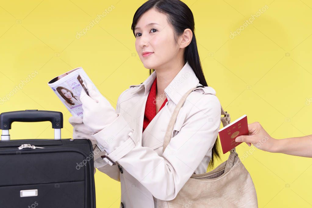 Thief stealing a passport from the women's bag