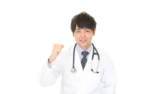 Smilende Asiatisk Læge - Stock-foto