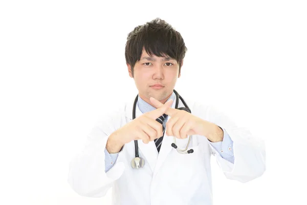 Asian Doctor Shows Sign Prohibition — Stock Photo, Image