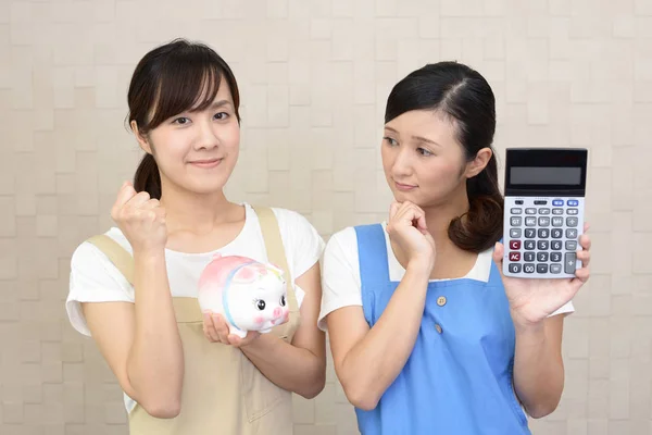 Asian women with calculator