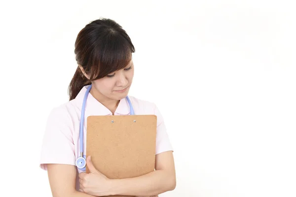 Enttäuschte Asiatische Krankenschwester Isoliert Auf Weißem Hintergrund — Stockfoto