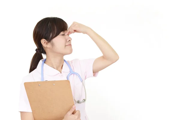 Eine Krankenschwester Die Kopfschmerzen Hat — Stockfoto