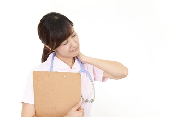 Enfermeira Que Tem Uma Dor Ombro — Fotografia de Stock