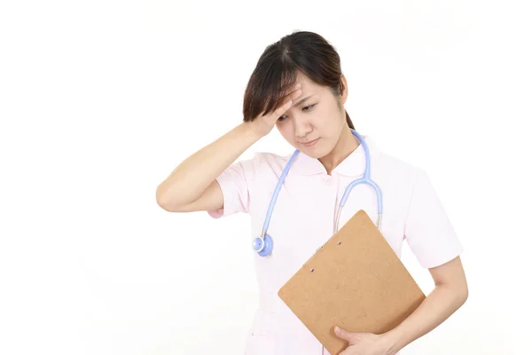 Eine Krankenschwester Die Kopfschmerzen Hat — Stockfoto