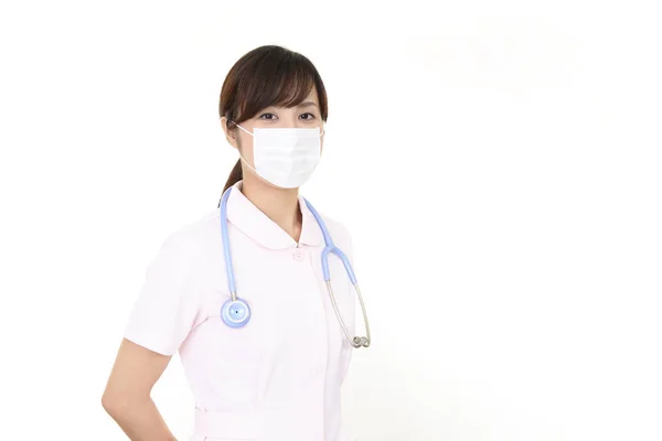 Vrouwelijke Verpleegkundige Met Protect Masker Haar Gezicht — Stockfoto