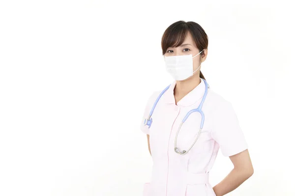그녀의 얼굴에 마스크 간호사 — 스톡 사진