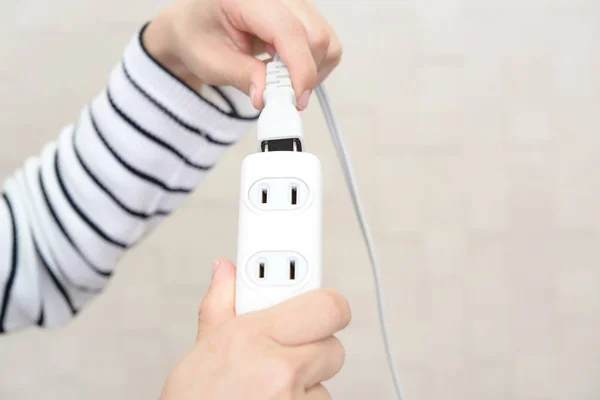 Woman Holding Electric Plug Extension Cord — Stock Photo, Image