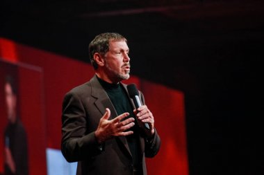 SAN FRANCISCO, CA - SEPT 24, 2008: CEO of Oracle Larry Ellison makes his speech at Oracle OpenWorld conference in Moscone center on Sept 24, 2008 clipart