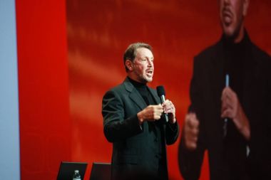 SAN FRANCISCO, CA - SEP 22, 2010: CEO of Oracle Larry Ellison makes his speech at Oracle OpenWorld conference in Moscone center on Sep 22, 2010. He is the third in the Forbes list of richest US persons clipart