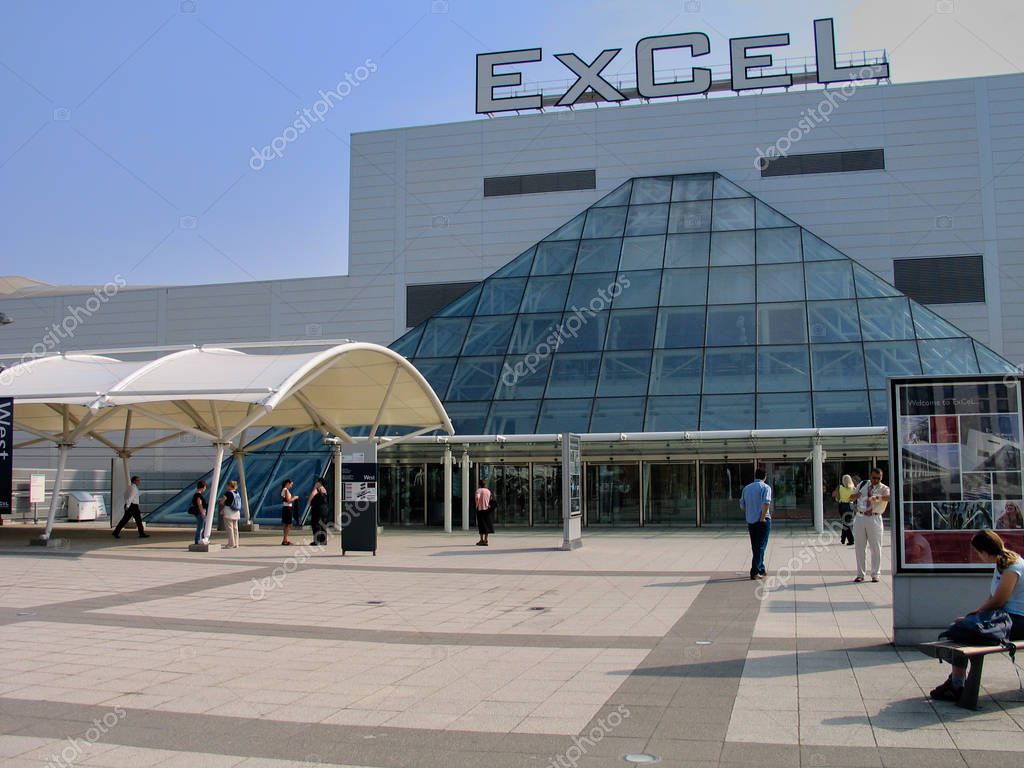 LONDON, UK - SEPT 6, 2004: People at entrance to international exhibitions and convention centre ExCeL at Dockland  area in London, UK on Sept 6, 2004