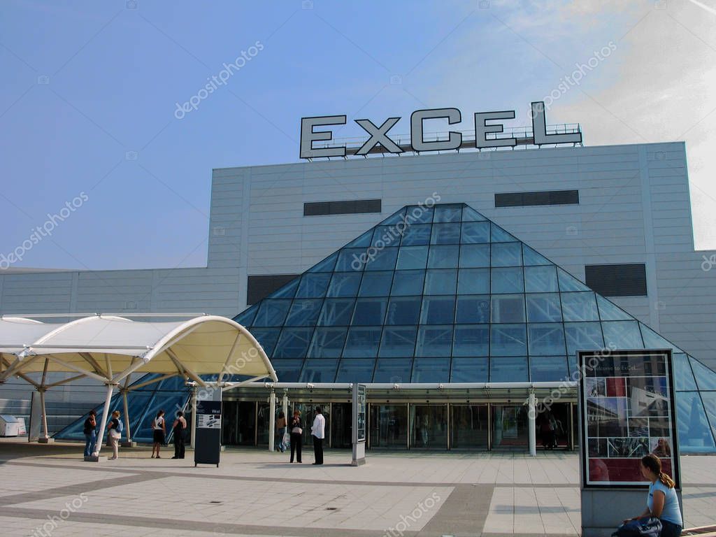 LONDON, UK - SEPT 6, 2004: People at entrance to international exhibitions and convention centre ExCeL at Dockland  area in London, UK on Sept 6, 2004