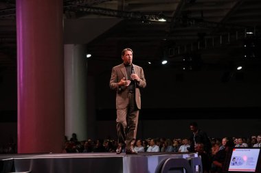 SAN FRANCISCO, CA, USA - NOV 14, 2007: CEO of Oracle Larry Ellison makes his speech at Oracle OpenWorld conference in Moscone center on Nov 14, 2007 clipart