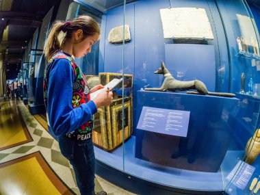 MOSCOW, RUSSIA - JAN 14, 2020: Schoolgirl studies the archaeolog