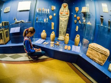 MOSCOW, RUSSIA - JAN 14, 2020: Schoolgirl studies the archaeolog