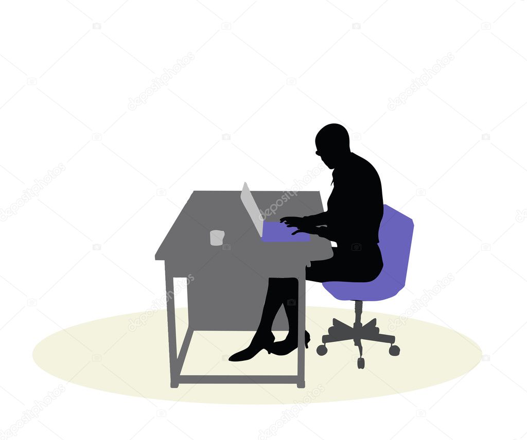 a business woman sitting at a desk
