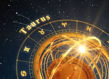 Zodyak işareti Toros ve Armillary küre mavi arka plan üzerinde